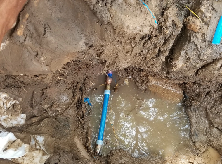 newly replaced blue underground pipe